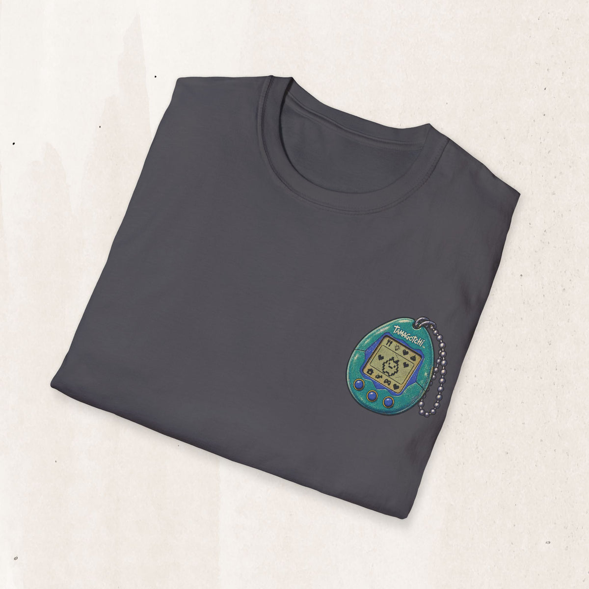 Tamagotchi Graphic Tee – Minimal Retro 90s Pocket Tee