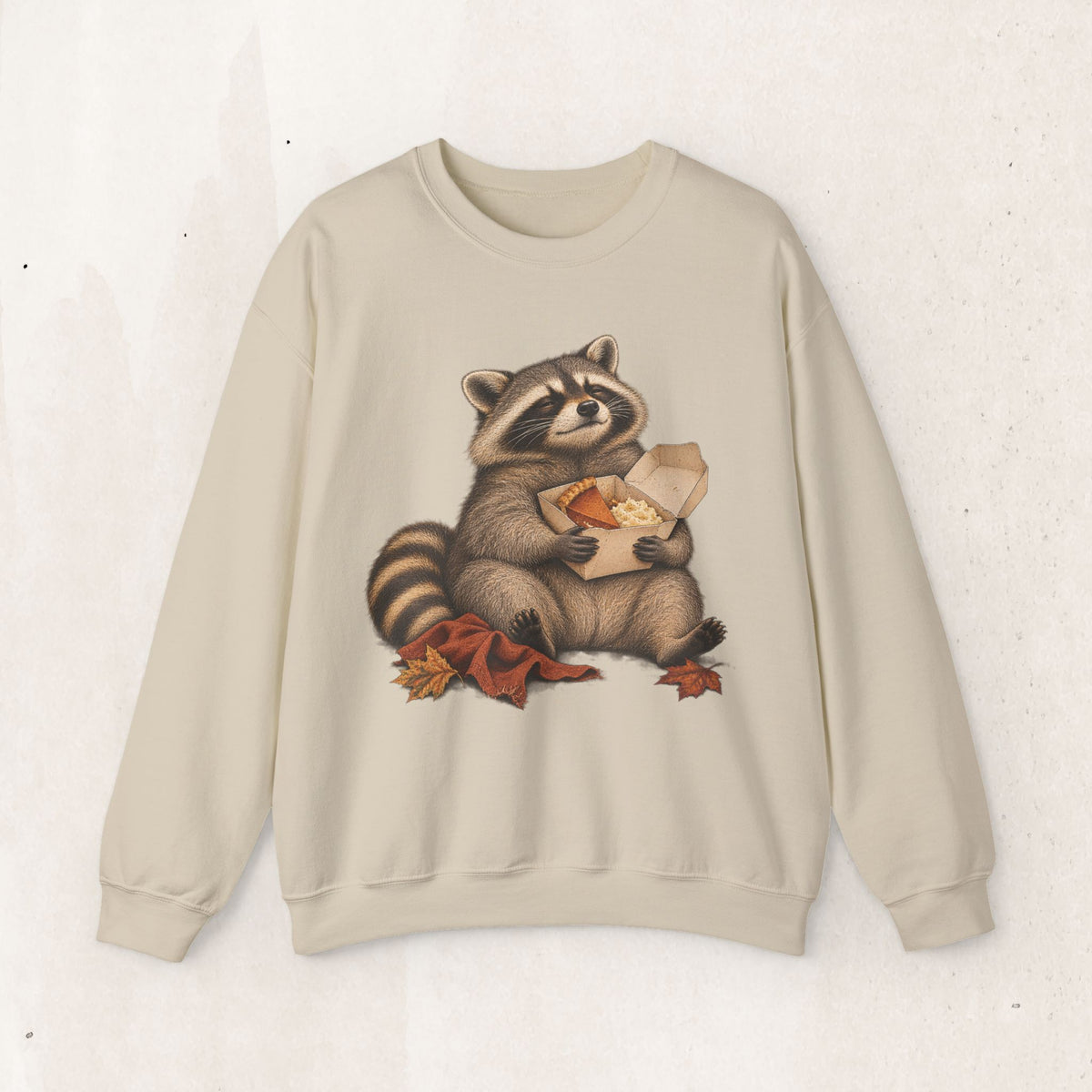 Cute raccoon fall crewneck sweatshirt with a vintage raccoon holding a mug in autumn leaves