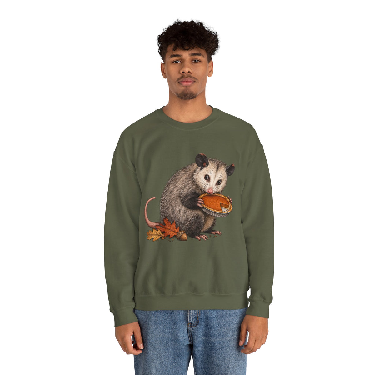 Opossum Thanksgiving sweatshirt with a cute possum hugging an orange pumpkin in autumn leaves