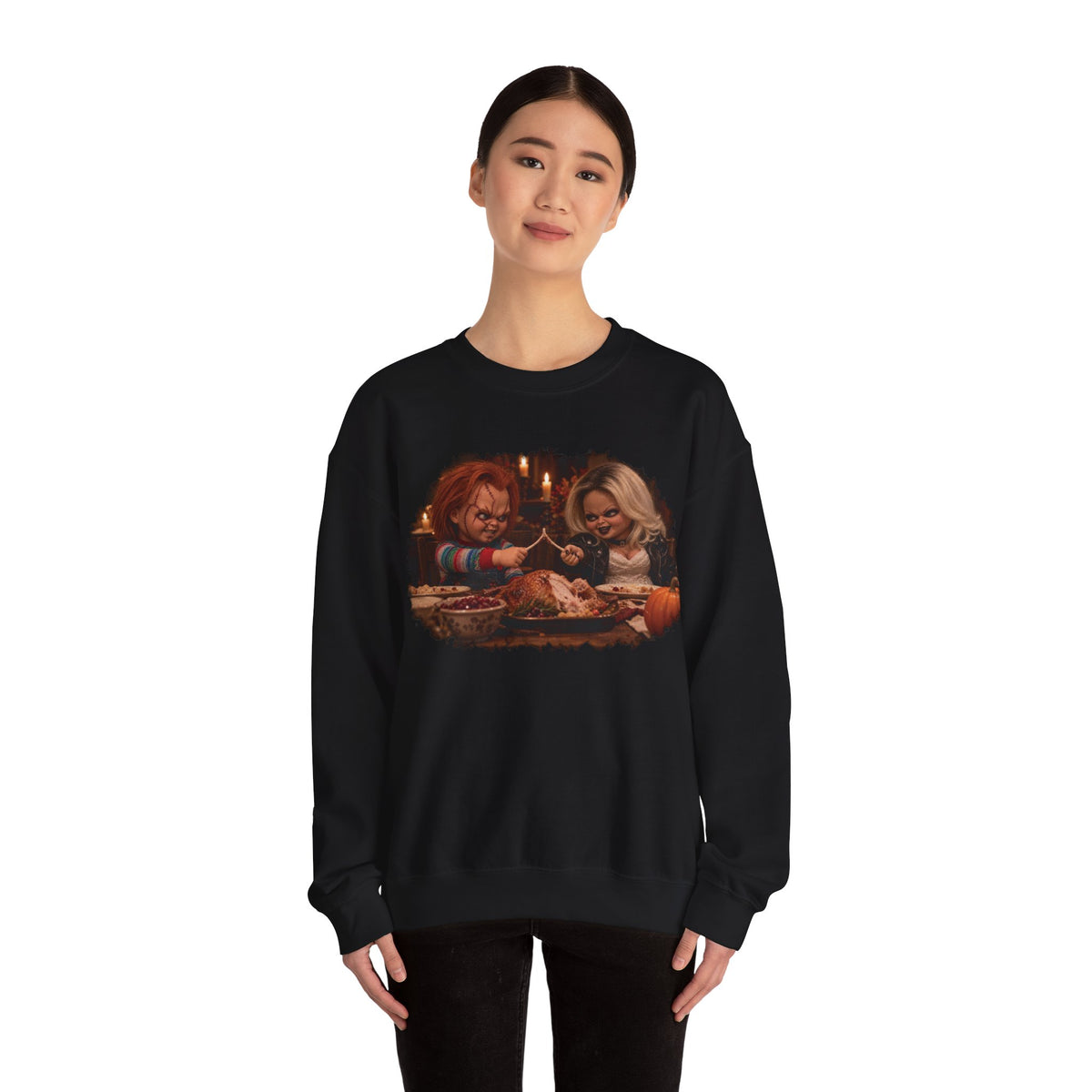 Woman wearing the Chucky & Tiffany Thanksgiving wishbone sweatshirt in Black, front view