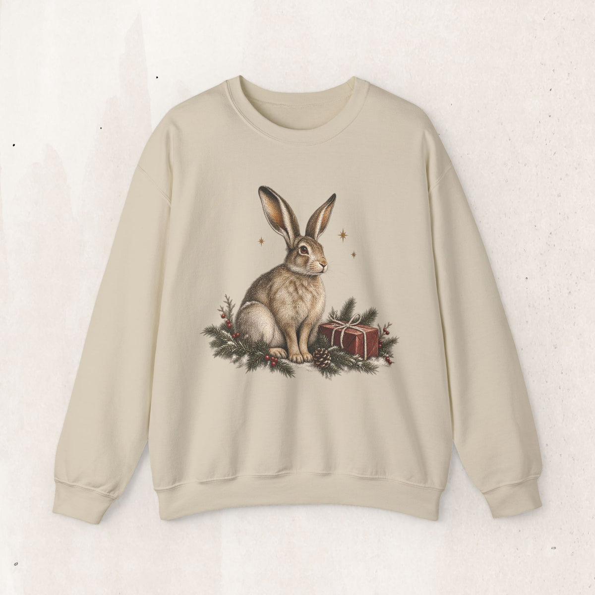 Christmas bunny sweatshirt with a vintage woodland rabbit, evergreen branches, stars and gifts