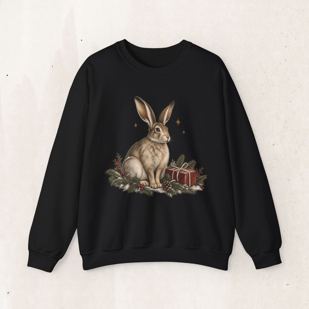 Christmas bunny sweatshirt with a vintage woodland rabbit, evergreen branches, stars and gifts