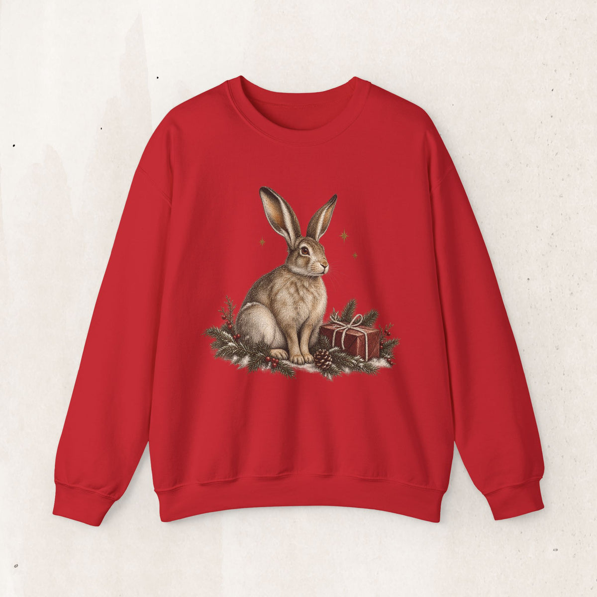 Christmas bunny sweatshirt with a vintage woodland rabbit, evergreen branches, stars and gifts