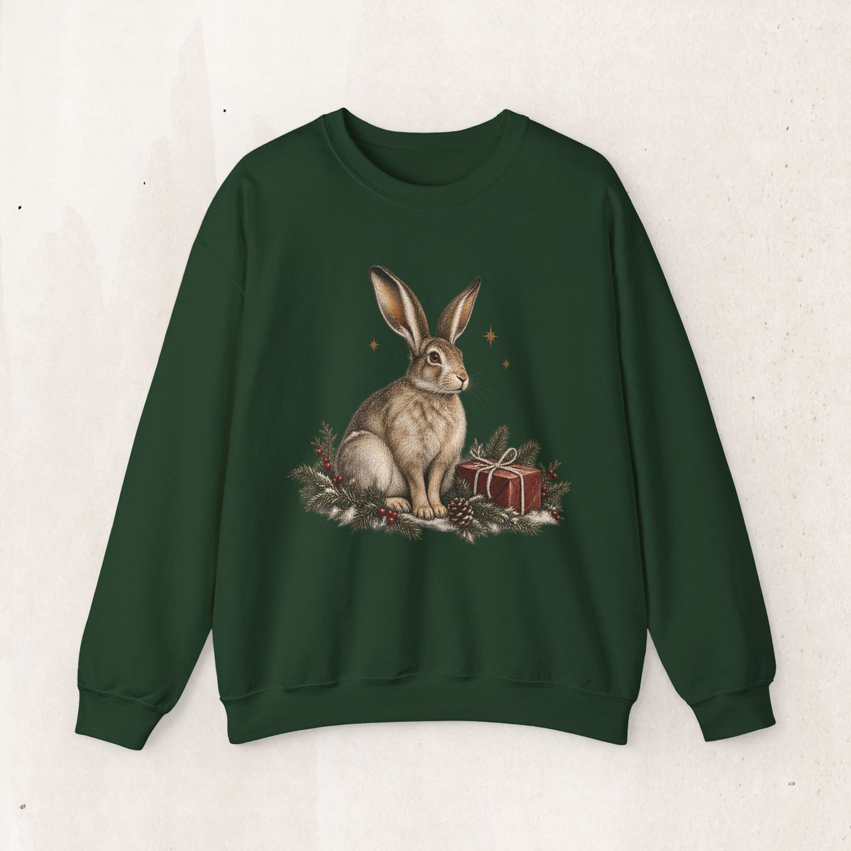 Christmas bunny sweatshirt with a vintage woodland rabbit, evergreen branches, stars and gifts