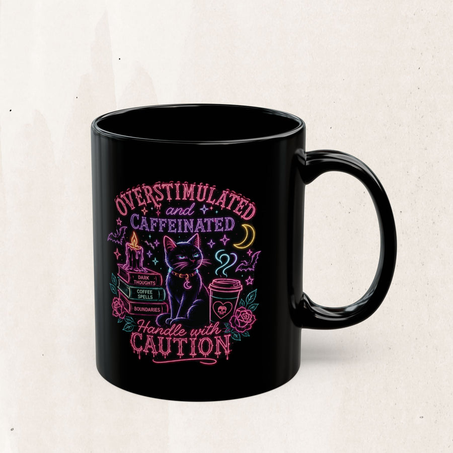 Black Cat Caffeine Mug — "Overstimulated and Caffeinated" Neon Coffee Cup
