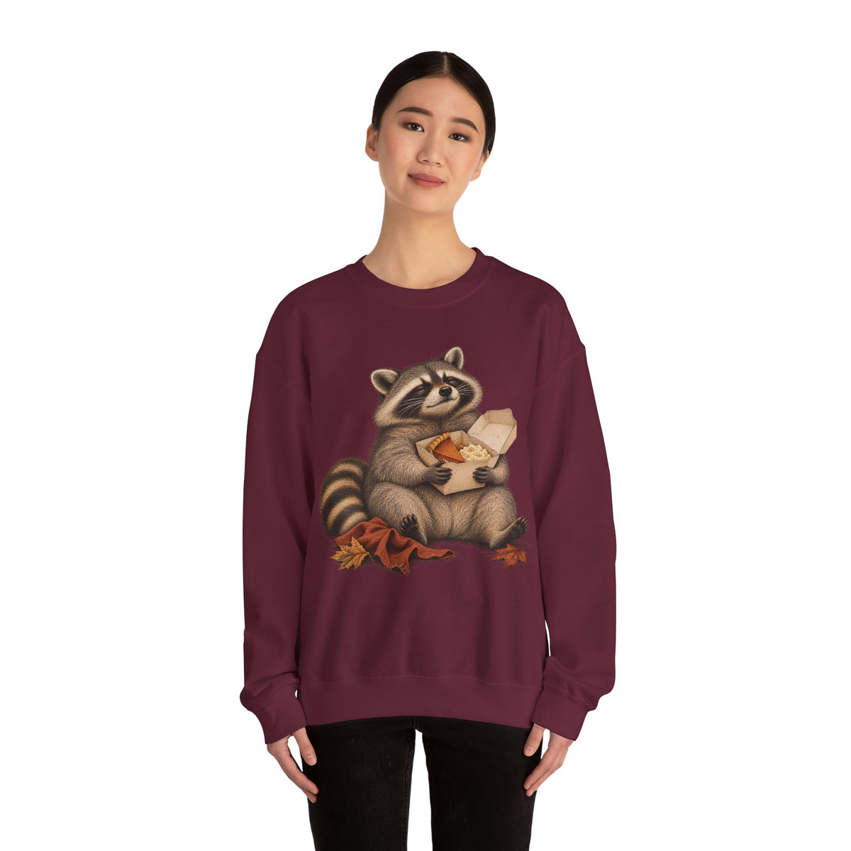 Cute raccoon fall crewneck sweatshirt with a vintage raccoon holding a mug in autumn leaves