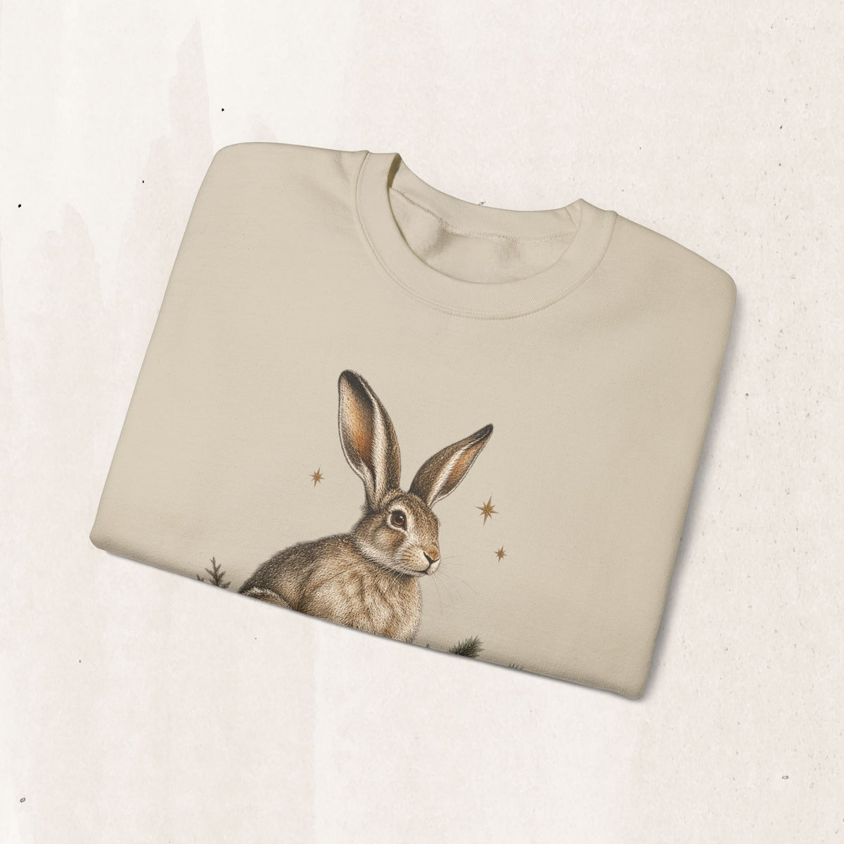 Christmas bunny sweatshirt with a vintage woodland rabbit, evergreen branches, stars and gifts