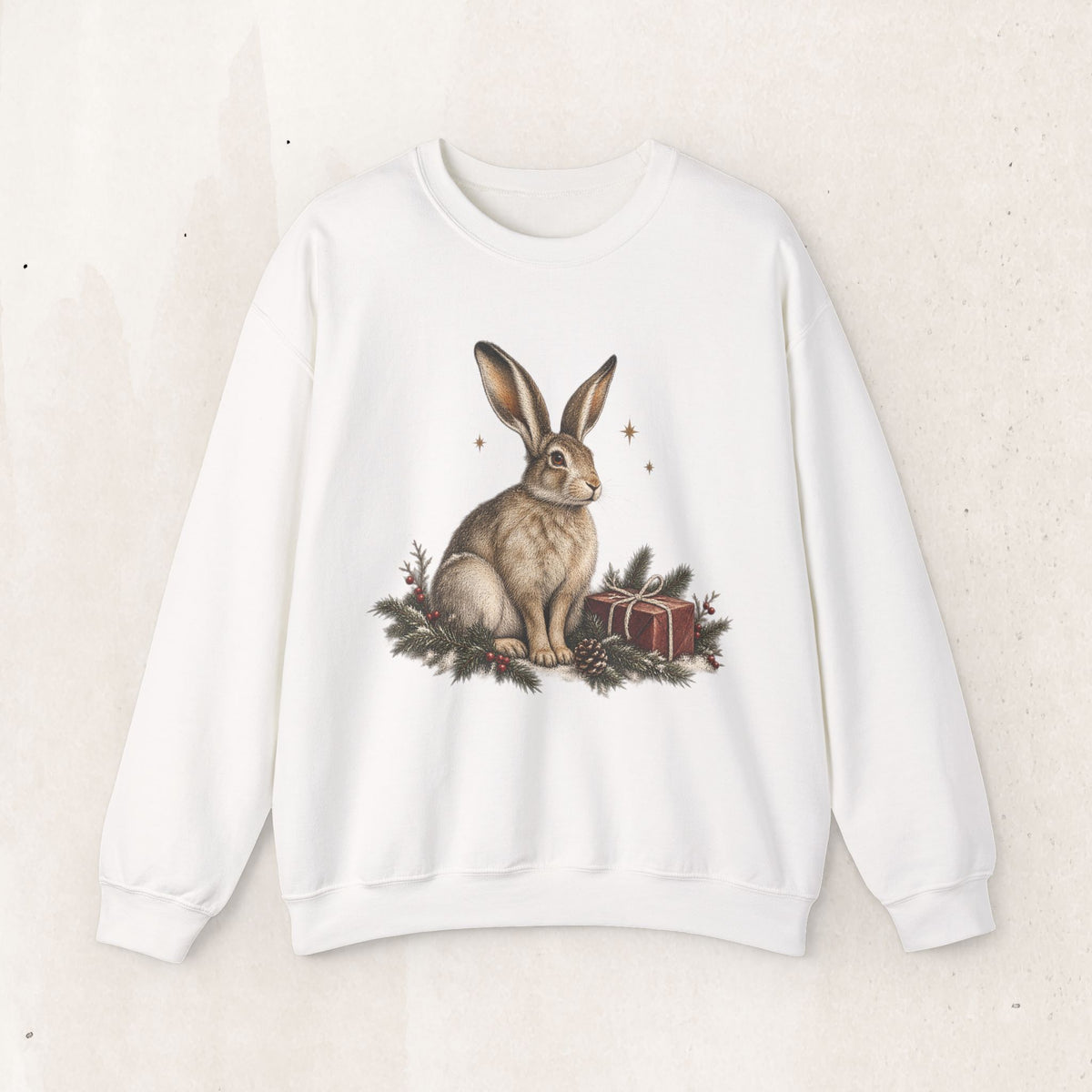Christmas bunny sweatshirt with a vintage woodland rabbit, evergreen branches, stars and gifts