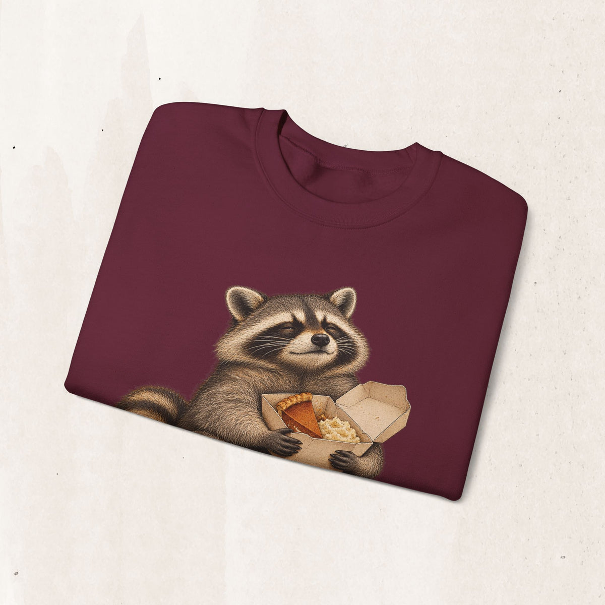 Cute raccoon fall crewneck sweatshirt with a vintage raccoon holding a mug in autumn leaves