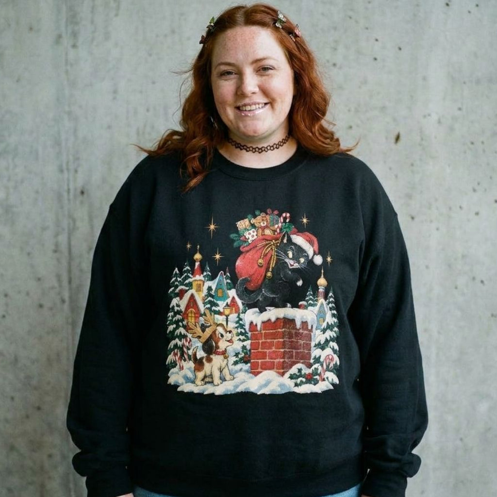 Model wearing Christmas Santa Bear Sweatshirt against a cement wall