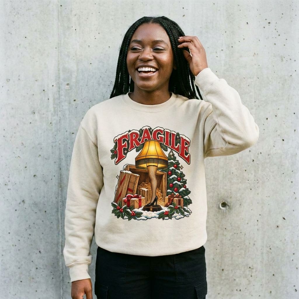 Model wearing A Christmas Story Leg Lamp Sweatshirt against a cement wall