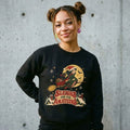 Model wearing Sleighs Are for Amateurs Christmas Sweatshirt against a cement wall