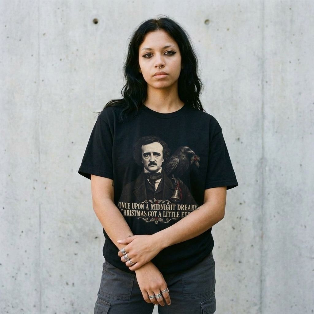 Model wearing Edgar Allan Poe Raven Tee against a cement wall
