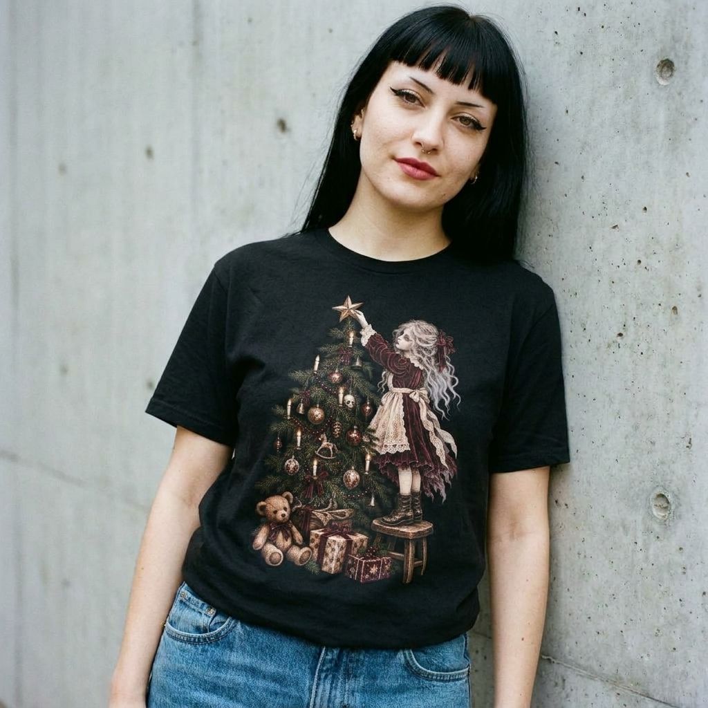 Model wearing Victorian Ghost Girl Christmas Tee against a cement wall
