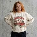 Model wearing The Most Wonderful Time of the Year Vintage Red Truck Sweatshirt against a cement wall