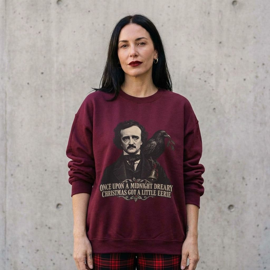 Model wearing Edgar Allan Poe Christmas Crewneck Sweatshirt against a cement wall