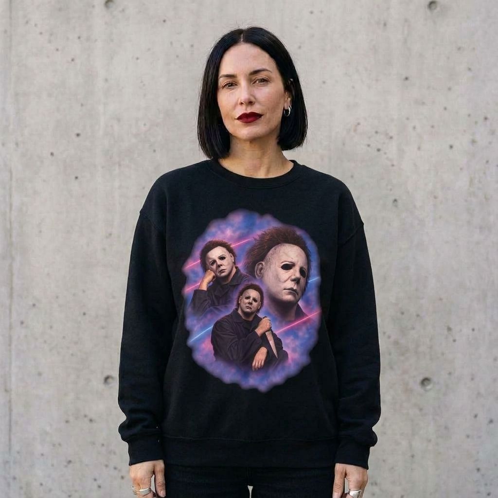 Model wearing Michael Myers 80's Glamour Shot Sweatshirt against a cement wall