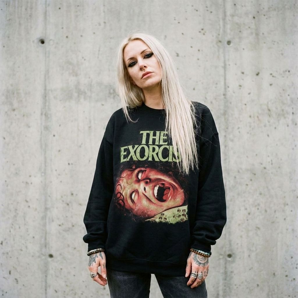 Model wearing The Exorcist Horror Movie Crewneck Sweatshirt – Vintage Cult Classic against a cement wall