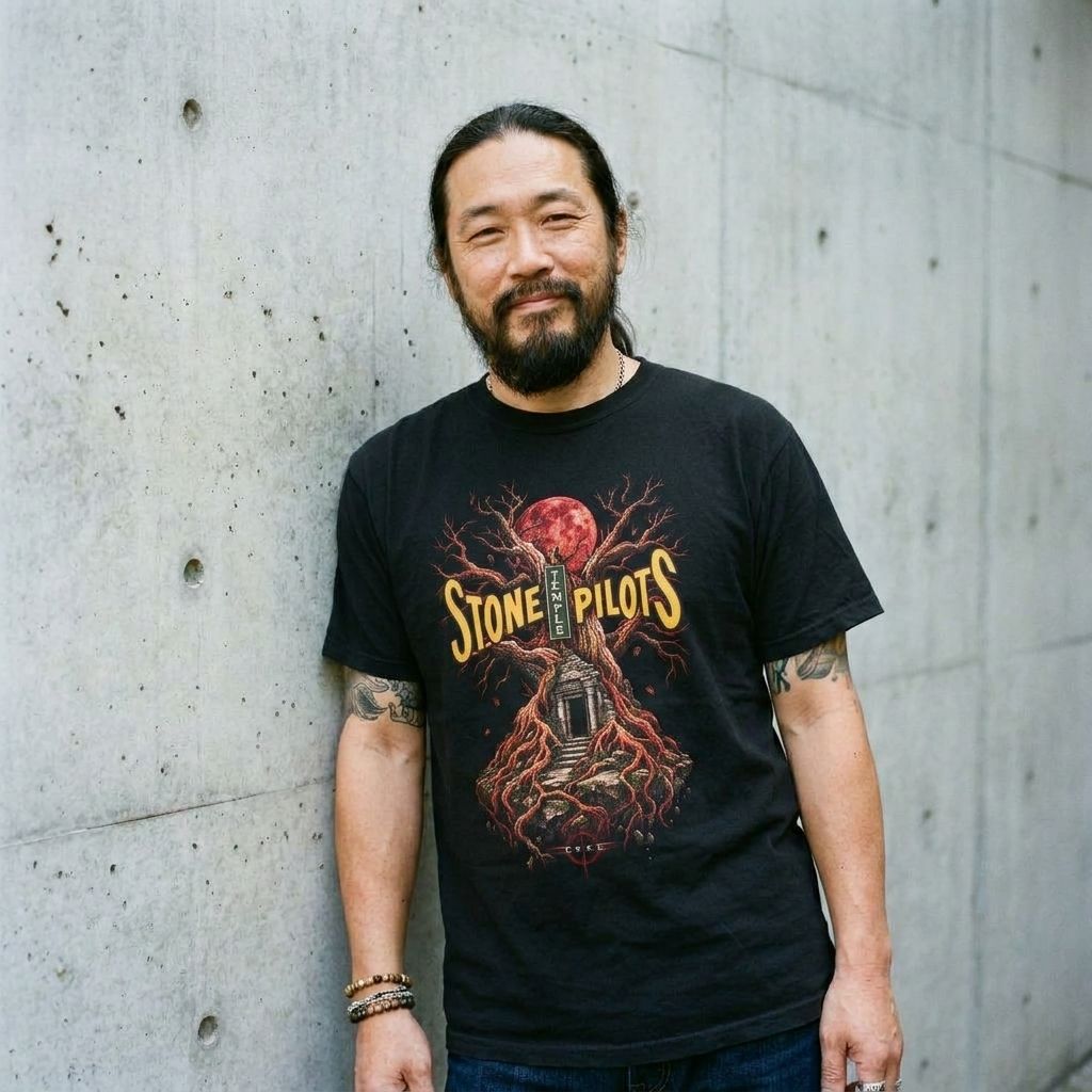 Model wearing Stone Pilots Vintage Rock Tee – Distressed Retro Band Shirt against a cement wall