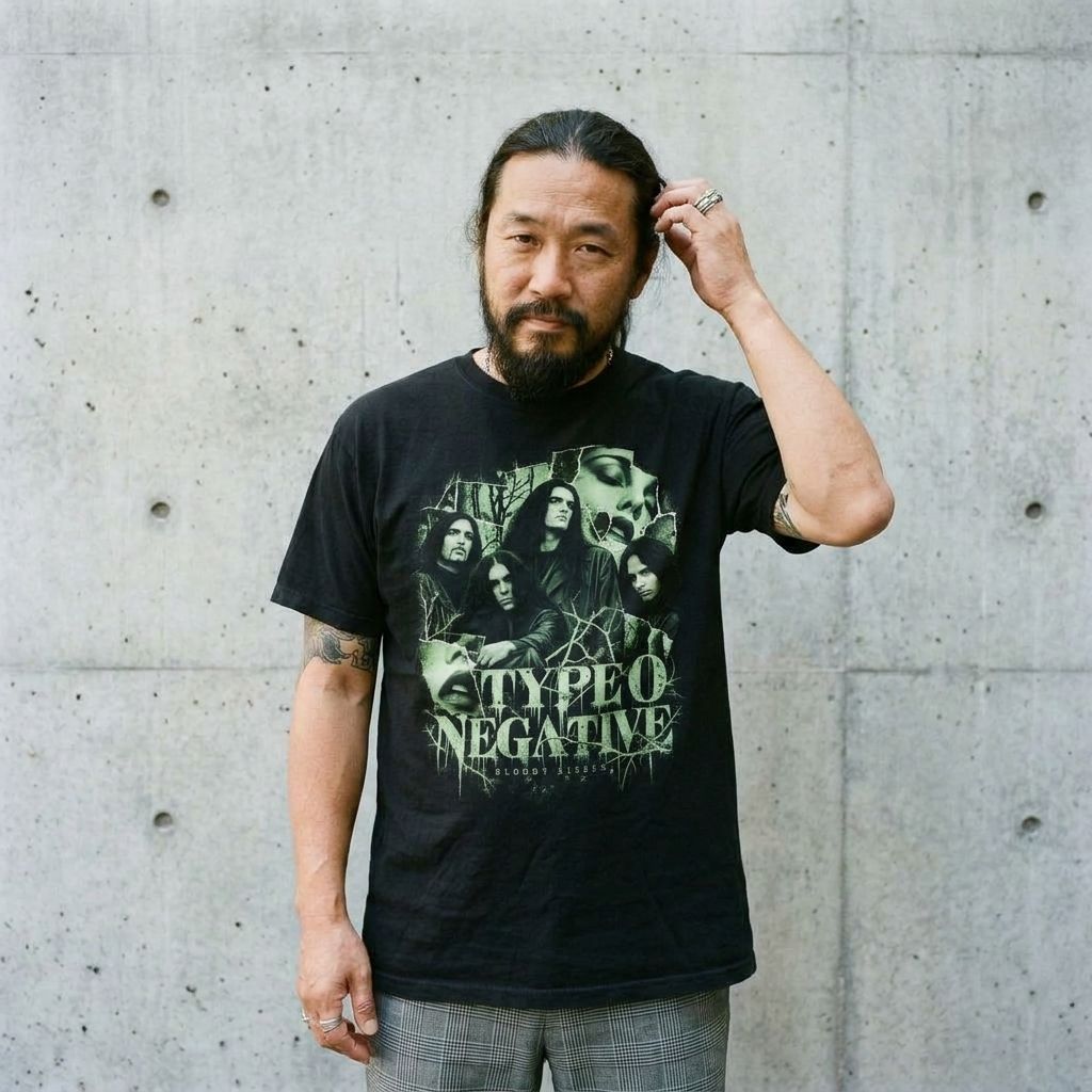 Model wearing Type O Negative Band Tee against a cement wall