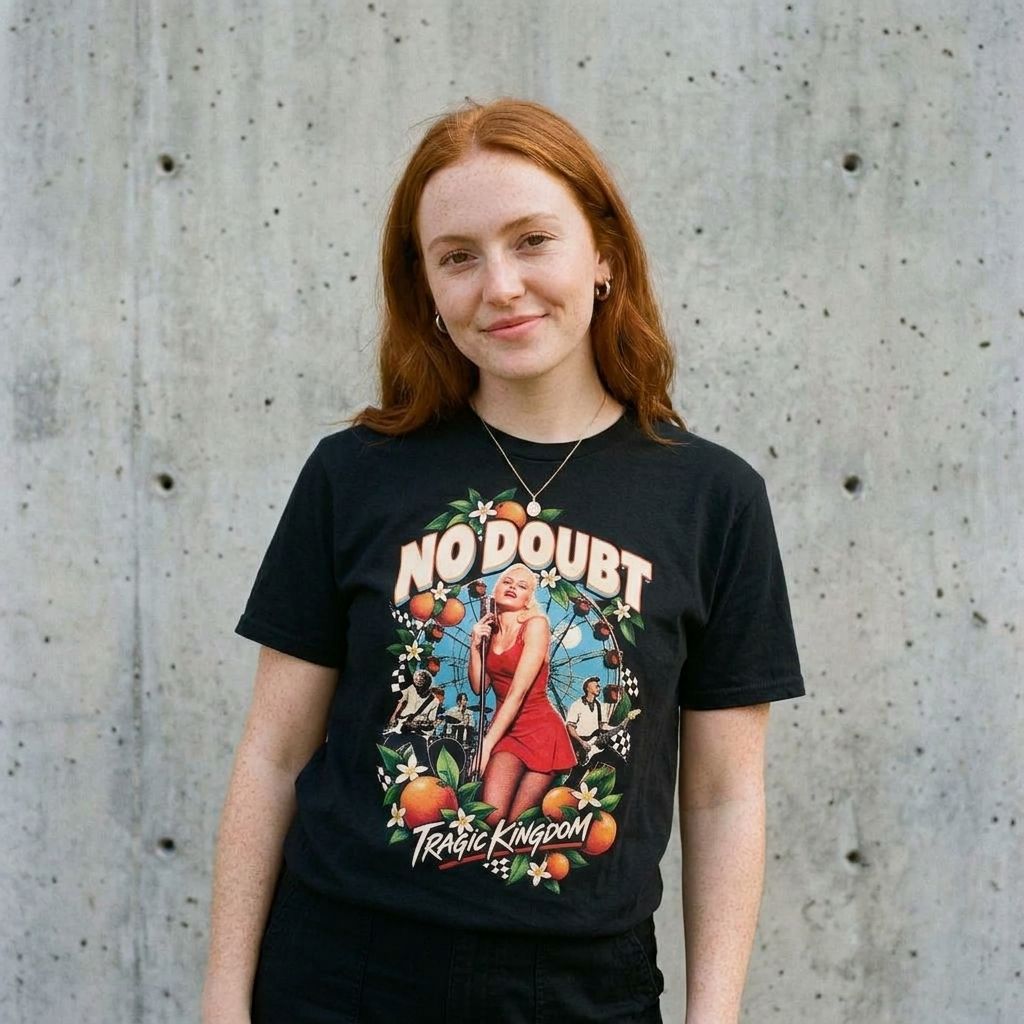 Model wearing No Doubt "Tragic Kingdom" Tee against a cement wall