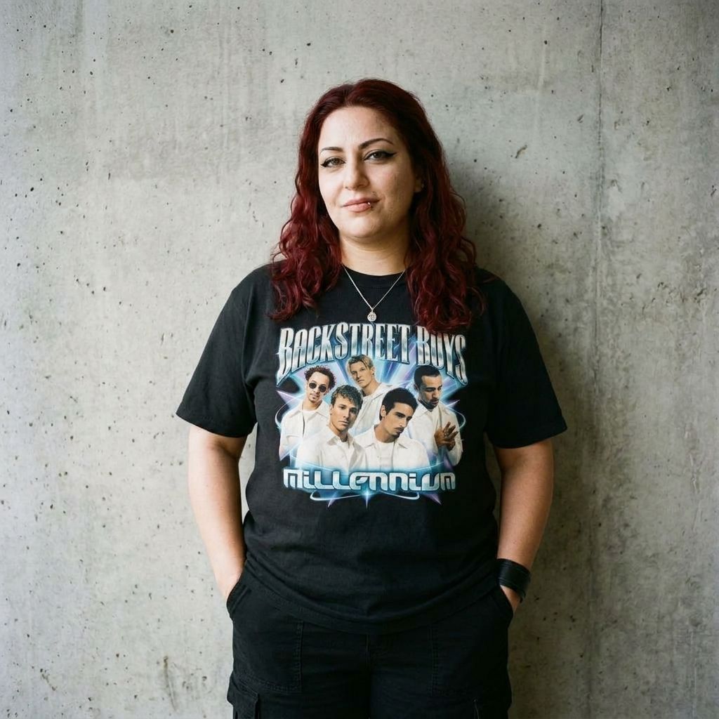 Model wearing Backstreet Boys 'Millennium' Pop Tour Tee against a cement wall