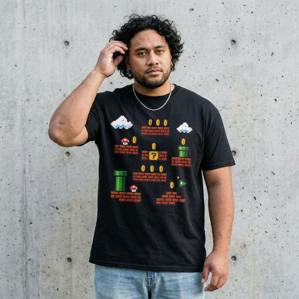Model wearing Pixel Mario-Inspired Graphic Tee against a cement wall