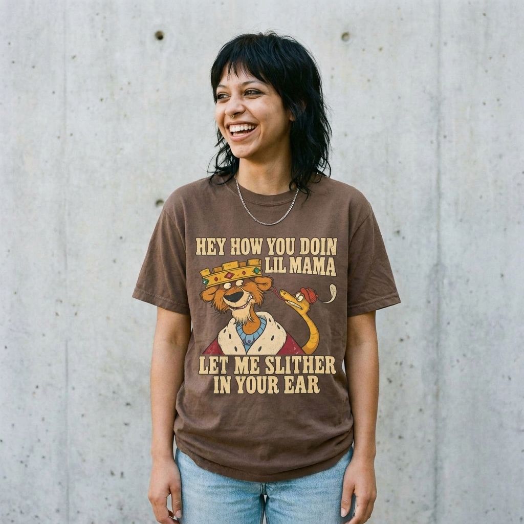 Model wearing Robin Hood Rap Parody Graphic Tee against a cement wall