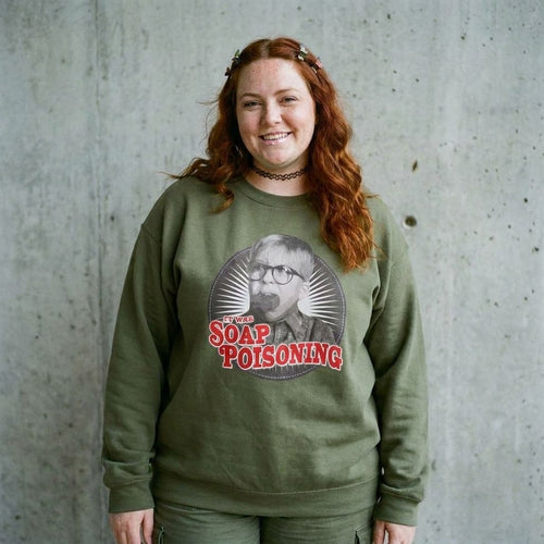 Model wearing A Christmas Story Soap Poisoning Funny Crewneck Sweatshirt against a cement wall