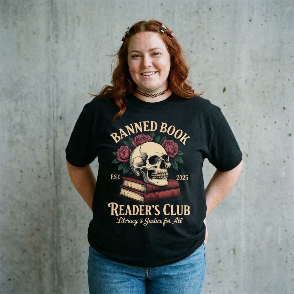 Model wearing Banned Book Reader's Club Tee against a cement wall