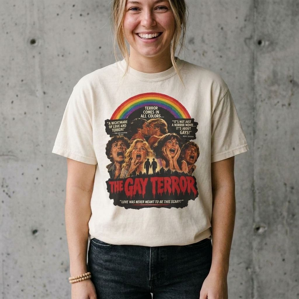 Model wearing The Gay Terror Vintage Poster Tee against a cement wall
