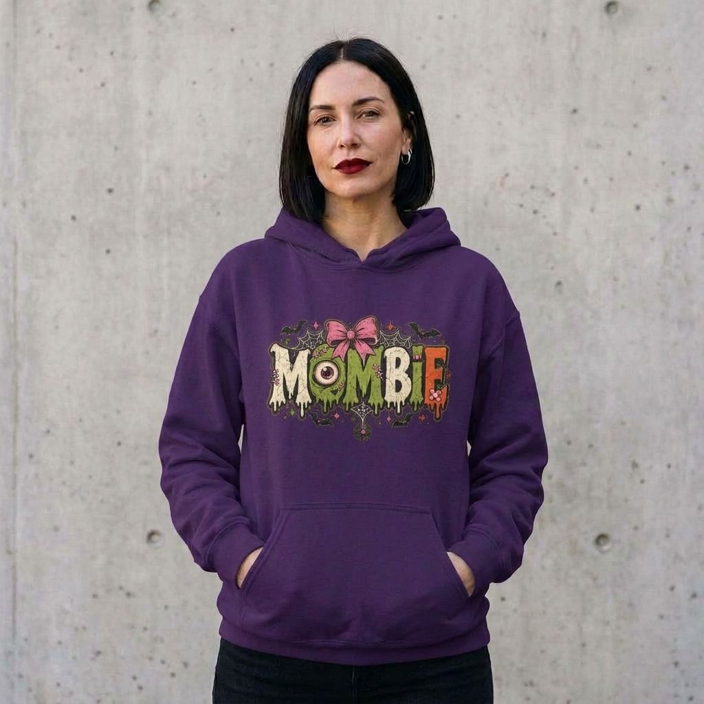 Model wearing Mombie Halloween Pullover Hoodie against a cement wall