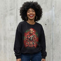 Woman wearing the Ghostface and Jason 80s glamour portrait horror Christmas sweatshirt against a cement wall