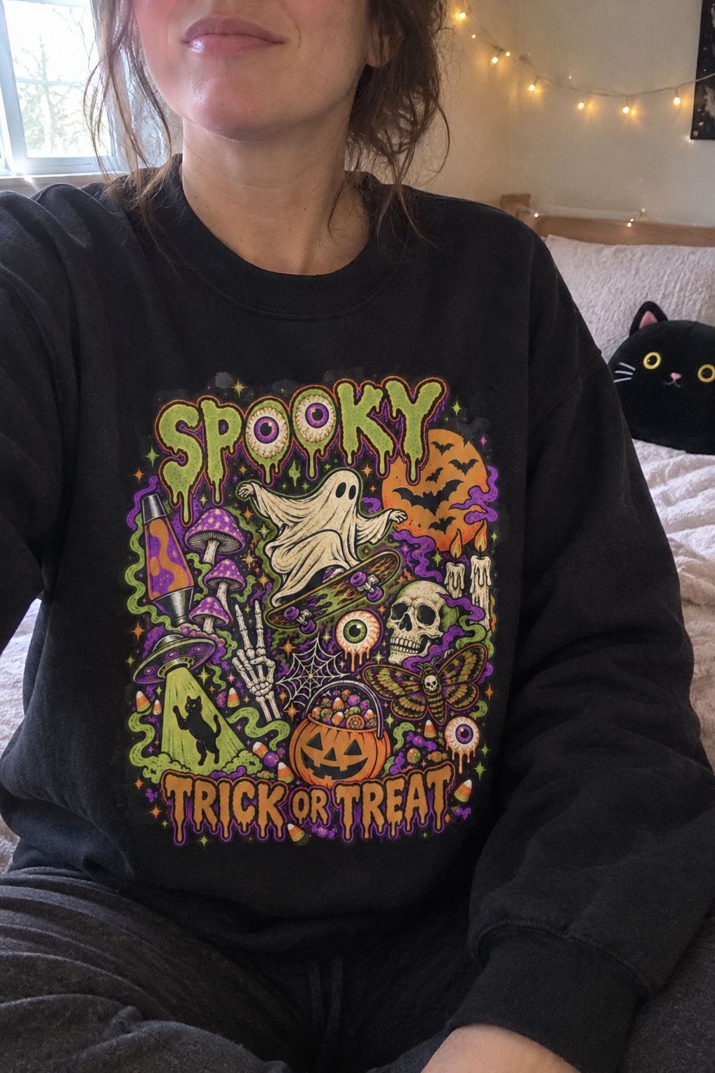 Halloween Spooky Trick or Treat Sweatshirt lifestyle photo