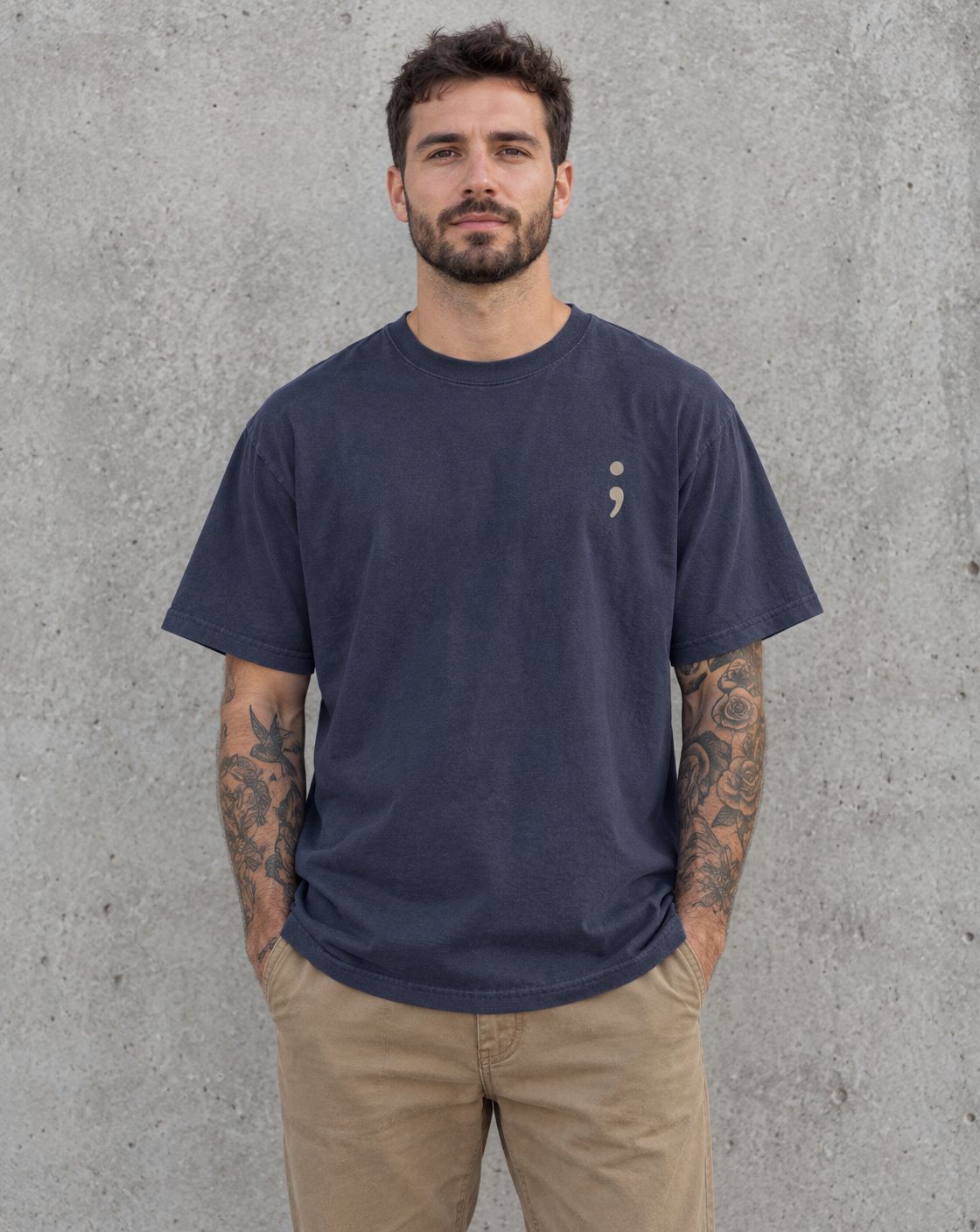 Model wearing the navy I Got Your Six t-shirt, front view with small semicolon