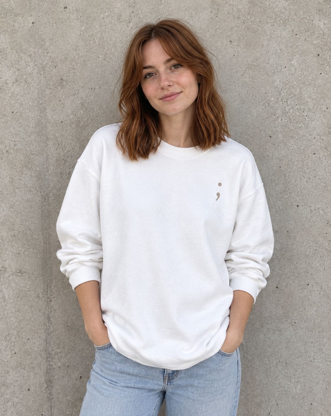 Model wearing the white To the Person Behind Me, You Matter crewneck sweatshirt, front view with small semicolon