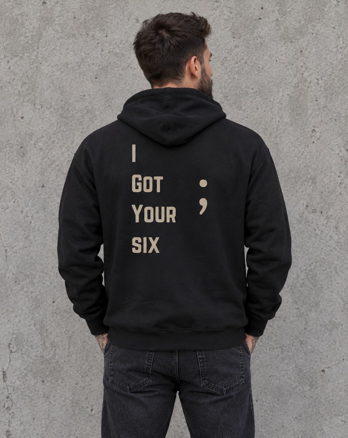 Model wearing the black I Got Your Six veteran suicide awareness zip up hoodie, back view