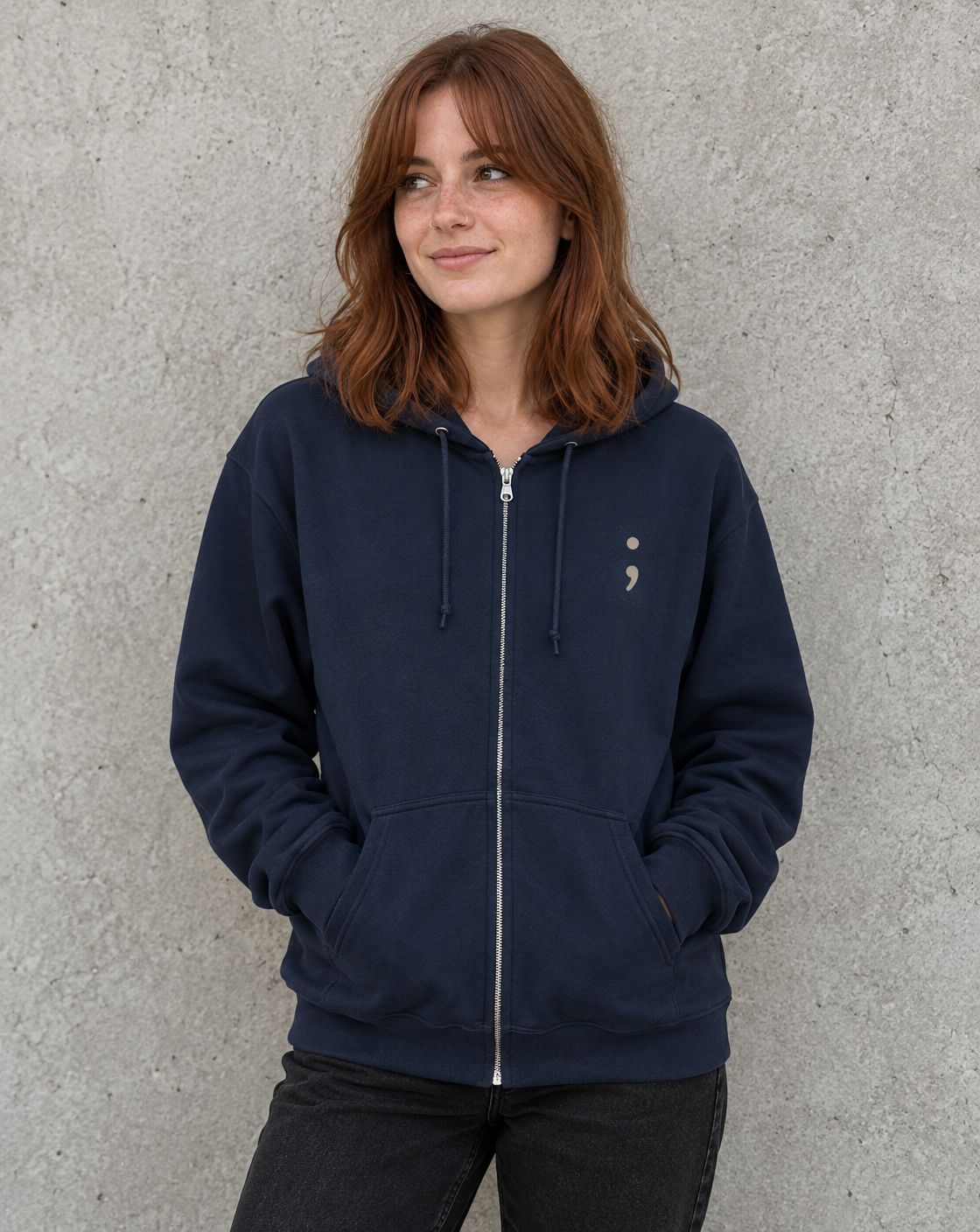 Model wearing the navy To the Person Behind Me, You Matter zip up hoodie, front view with small semicolon