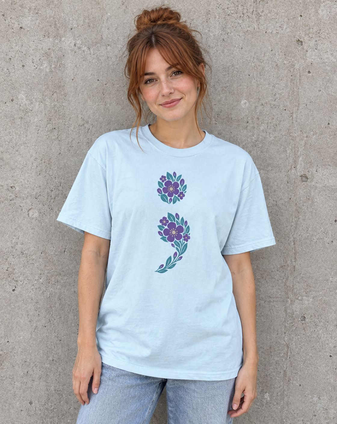 Model wearing the floral semicolon suicide awareness t-shirt with purple and teal flowers