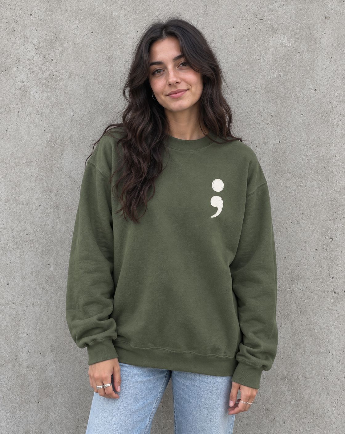 Model wearing the military green minimalist semicolon suicide awareness crewneck sweatshirt