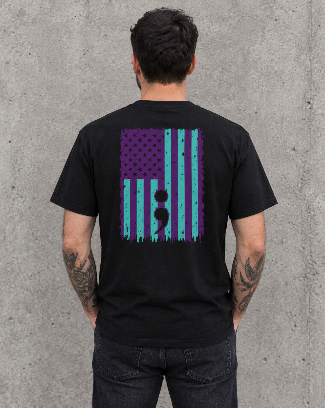 Model wearing the black purple and teal flag semicolon suicide awareness t-shirt, back view
