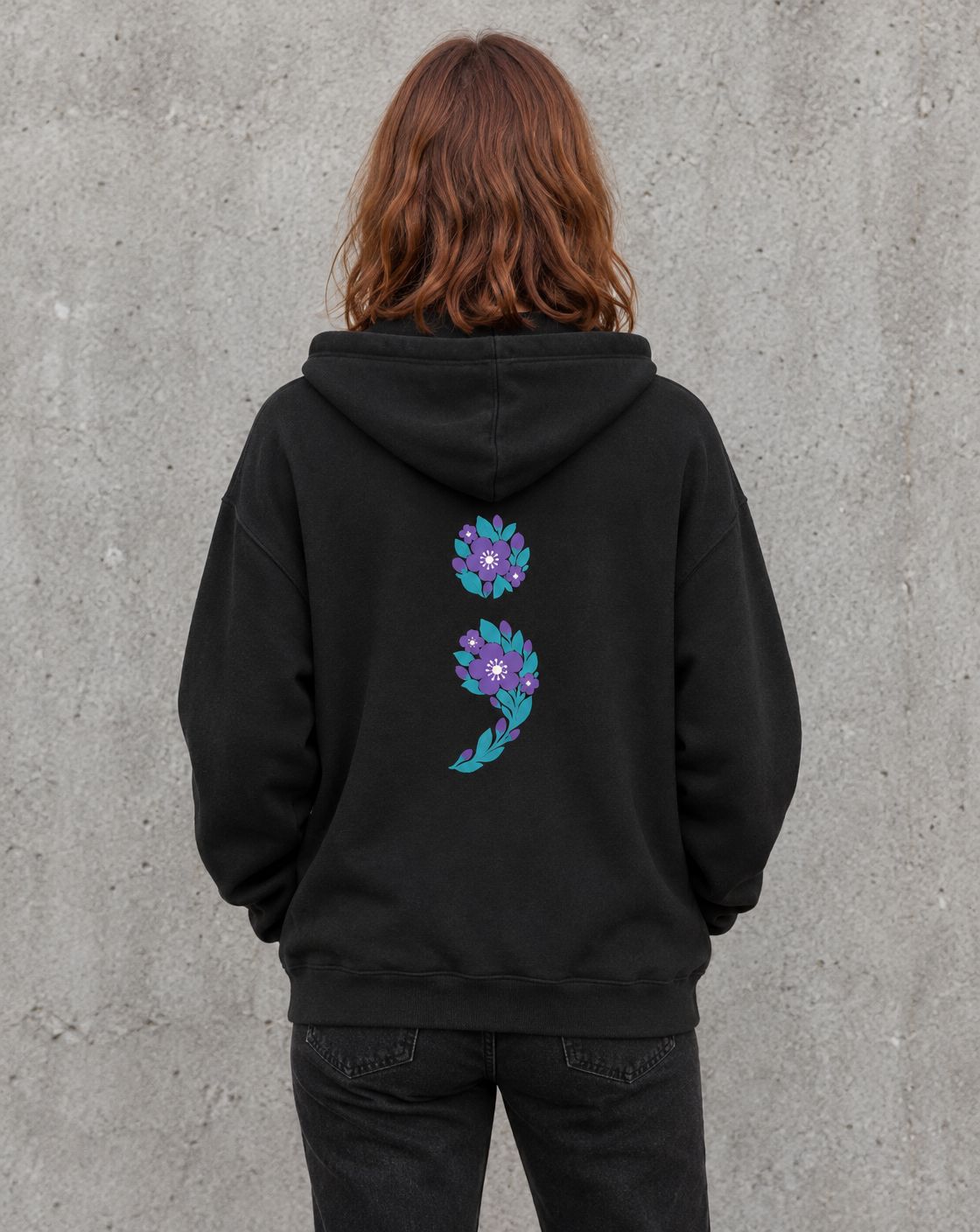 Model wearing the black floral semicolon suicide awareness zip up hoodie, back view