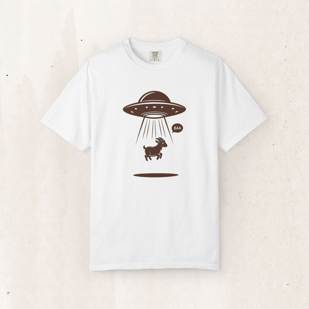 Wicked Thread Society white heavyweight cotton t-shirt featuring a brown UFO alien abduction goat graphic print.