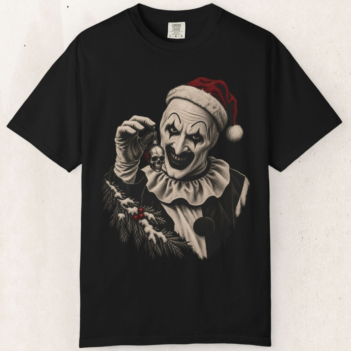 Wicked Thread Society black cotton t-shirt featuring a vintage-style Art the Clown graphic in a Santa hat.