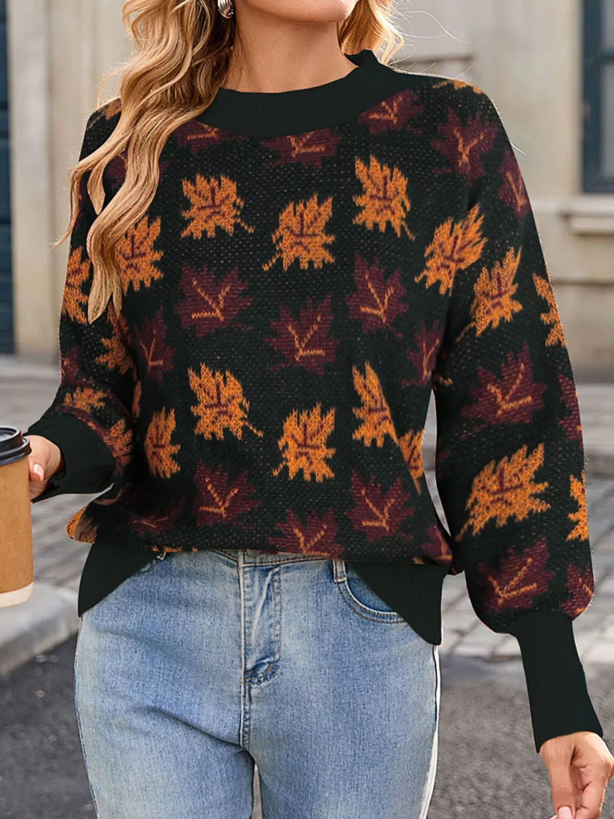 Wicked Thread Society mock neck sweater featuring a black base with orange and burgundy autumn leaf patterns.