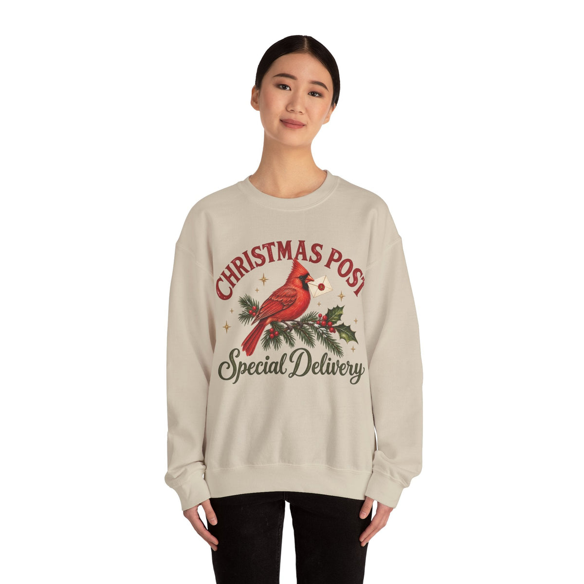 Wicked Thread Society beige crewneck sweatshirt featuring a red cardinal bird illustration and Christmas Post text.