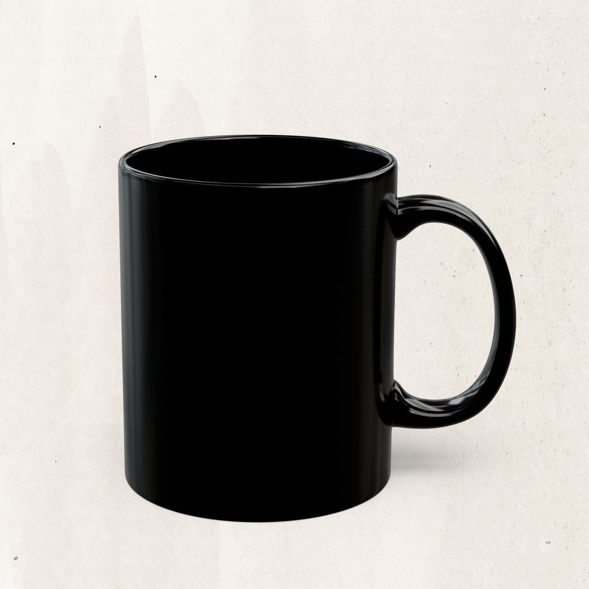 Wicked Thread Society glossy black ceramic coffee mug with a C-shaped handle on a neutral textured background