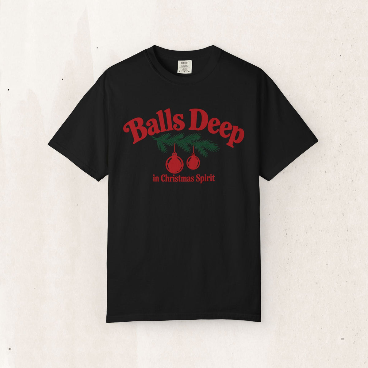 Wicked Thread Society black graphic tee featuring retro red Christmas ornaments and festive pine branch design.
