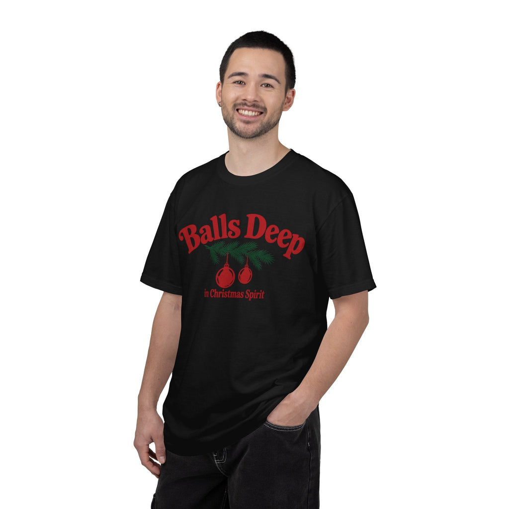Wicked Thread Society black graphic t-shirt with red Christmas ornament design on a smiling man.