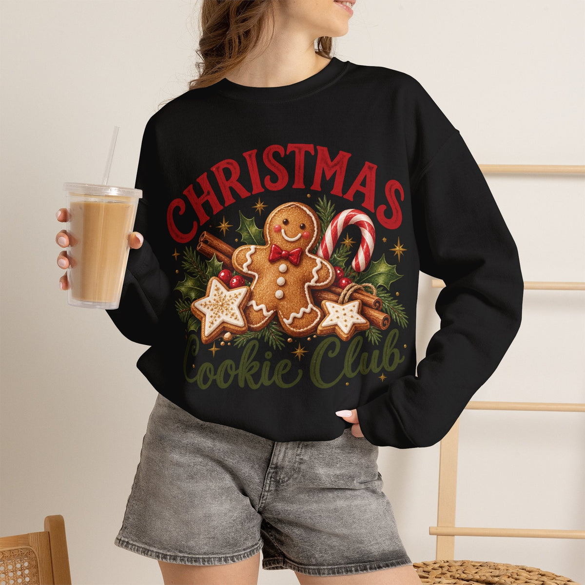 Wicked Thread Society black crewneck sweatshirt featuring a gingerbread man, candy cane, and Christmas cookie graphic.